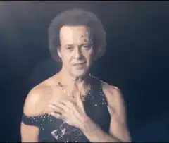 Richard Simmons blowing a kiss
