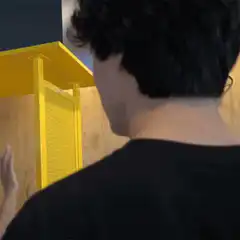Man turns head and looks at camera