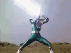 Green Ranger fires energy blast