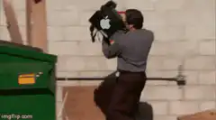 Man throws Apple laptop into dumpster