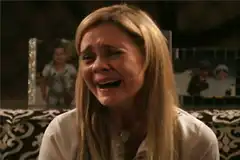 Crying woman being comforted