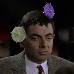 Mr. Bean with cocktail umbrellas