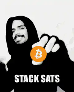 Man holding bitcoin stack sats