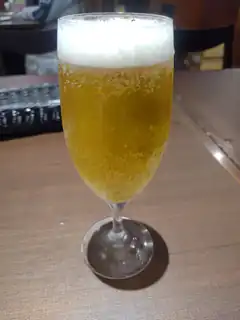 glass of beer with foam