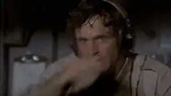 Man sweating and looking shocked