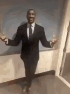 John Wall smiling and posing in suits