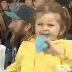 Baby girl eating blue ice cream powers up