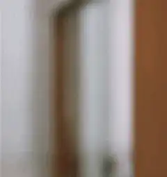 Man gives thumbs up then points