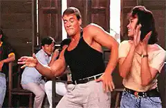 Jean-Claude Van Damme dancing in a classroom