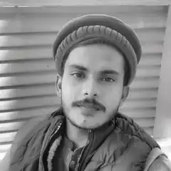 Man in beanie and vest