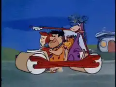 The Flintstones driving a car made of logs