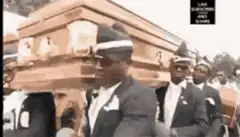men carrying coffin dancing