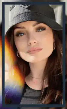 Woman in cap with rainbow light leak