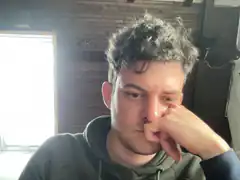 man picking nose