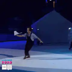 Man ice skating with paper airplane