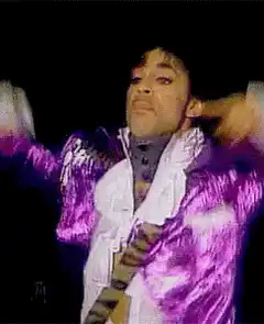 Will Smith dancing in purple jacket