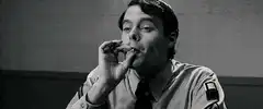 Officer Barney Fife smokes and smiles