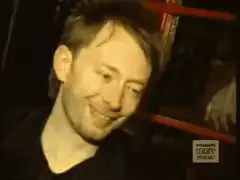 Thom Yorke smiling and nodding