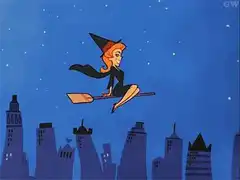 Witch flying on broomstick over city