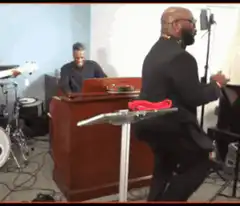 Pastor dancing enthusiastically in church