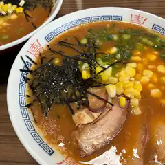Bowl of ramen with corn and pork