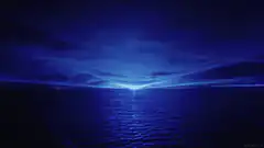 blue ocean horizon with light beam