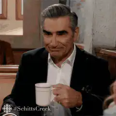 Johnny Rose Sipping Coffee
