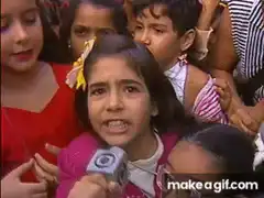 Girl crying into microphone