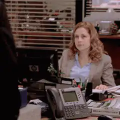 Pam Beesly raises hand
