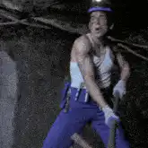Miner dancing in a cave