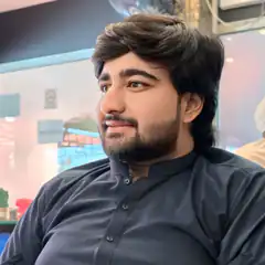 Man with beard looking sideways