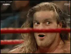 Triple H side-eye in wrestling ring