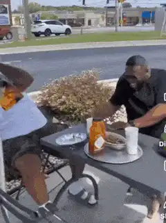 Man kicks chair and runs away