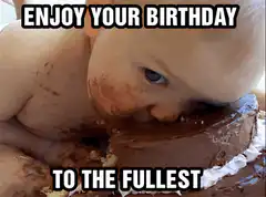 Baby smashing face into chocolate cake