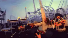 Couple on a swing ride at an amusement park