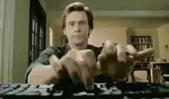 Jim Carrey typing with his fingers
