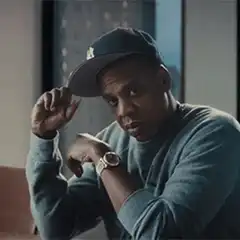 Jay-Z tipping his hat
