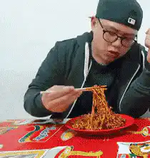Man reacts to spicy noodles
