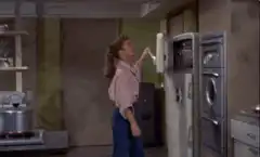 Woman hits head on freezer door