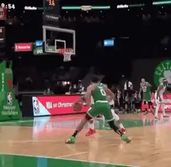 Jayson Tatum makes a shot and celebrates