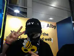 Person in Alby hat and bee shirt