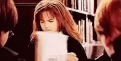 Hermione Granger looks up from book