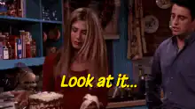 Rachel looks at her cake isn't it beautiful