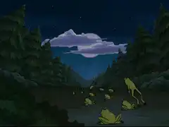 Frogs jumping away at night
