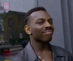 Man tapping his head thinking