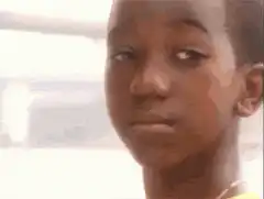 Sad boy turns away
