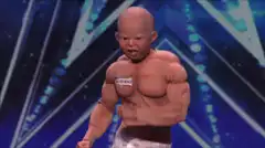 Muscular baby doll flexing