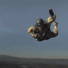 Skydiver deploying parachute