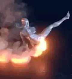 Silver man falling through fire