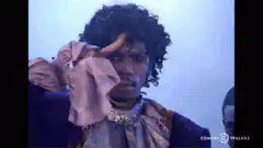 Man wipes face then looks shocked